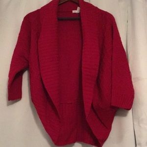 Red cardigan, size large.
